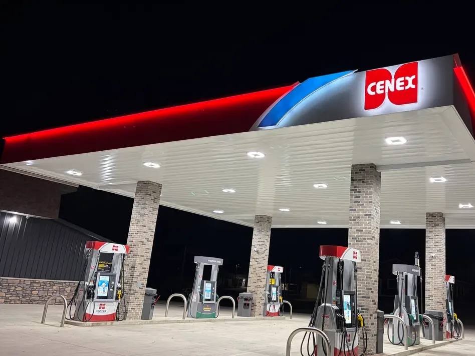 The lit Cenex canopy over Nading's fuel pumps at night